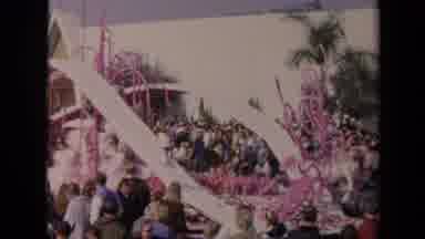 Los Angeles California USA (1967): Vintage Parade Float Passing By A Large Crowd