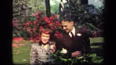 New York USA (1941): Two People Walking In The Garden And Stop To Talk To Each