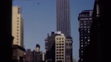 New York USA (1941): Camera Pans Up To Show Off The Tall Skyscraper Building