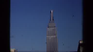 New York USA (1941): The Tall Tower Sits Atop The Skyscrape Of A Rundown City