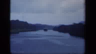 New York USA (1941): A Lake Surrounded By Forest With A Ship Streaming Towards Me