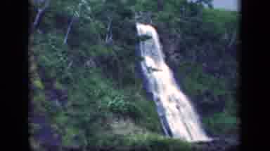 New York USA (1941): Waterfall In Green Forest Into Near River Old Footage