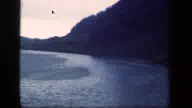 New York USA (1941): A Calm Body Of Water Between Two Mountains On A Cloudy Day