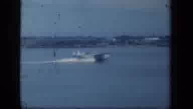 New York USA (1941): Plane Gracefully Glides Across The Surface Of The Body Of