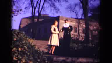 New York USA (1941): Military Man Shows Young Woman His Hat As They Walk Together