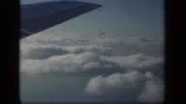 New York USA (1941): A View From Above The Clouds Thru The Airplane Window