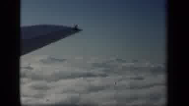 New York USA (1941): Endless Clouds And Blue Sky Outside Of The Plane's Window