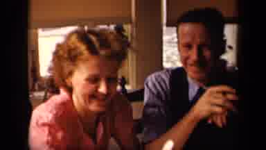 Sebring Ohio USA (1942): Old Timey Couple Laughing And Sharing A Meal & Smoke