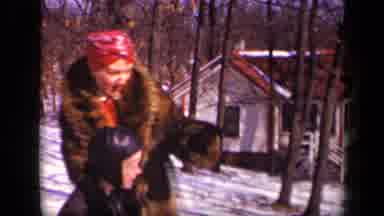 Sebring Ohio USA-1942: Woman Wearing Red Bandana And Fur Coat With Boy In Snowy Woods
