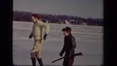 Sebring Ohio USA (1942): Family Playing In The Winter On Ice With A Gun