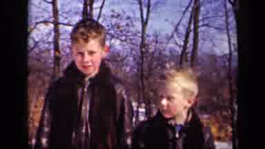 Sebring Ohio USA (1942): Children Wearing Dark Brown Coats On A Bright Sunny Day