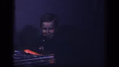 Sebring Ohio USA (1942): Older Child Talking In The Dark Room By Nice Desk