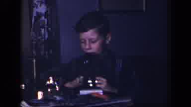 Sebring Ohio USA (1942): Boy Playing Harmonica