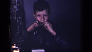 Sebring Ohio USA (1942): A Boy Playing A Harmonica