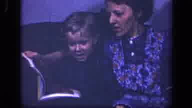 Sebring Ohio USA (1942): Woman And Boy Reading Magazine