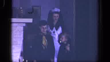 Sebring Ohio USA (1942): Person Dressed Up As A Nurse Moves Wig Onto Other Child