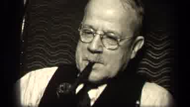 Sebring Ohio USA (1942): Older Gentleman In Glasses Smoking Tobacco With A Wooden