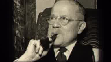 Sebring Ohio USA (1942): An Old Couple Spending Time Together Man Smoking Cigars