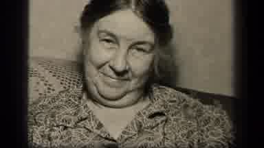 Sebring Ohio USA (1942): Smiling Old Woman Looking Into Camera Then Looking Away