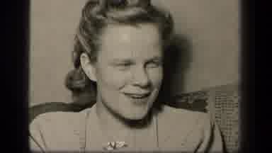Sebring Ohio USA (1942): Man In Black And White Smoking Pipe Talking To Woman With
