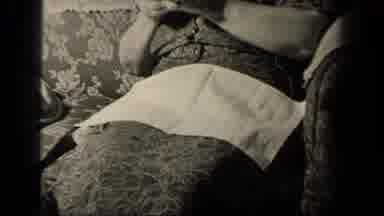 Sebring Ohio USA (1942): Sitting Down Knitting