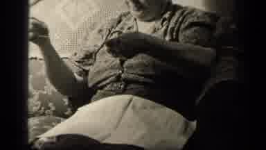 Sebring Ohio USA (1942): Older Woman With A Beautiful Smile Threading A Needle To