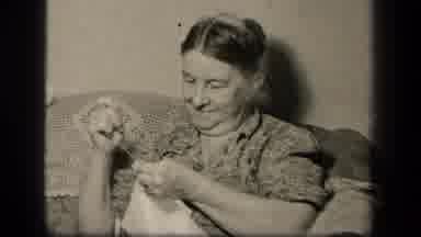 Sebring Ohio USA (1942): Happy Grandmother Sews While Sitting On The Couch While