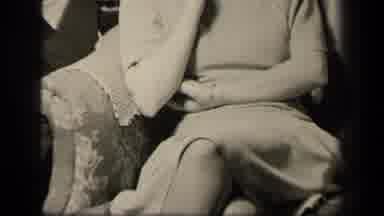 Sebring Ohio USA (1942): Camera Pans Up A Woman's Body As The Sits In A Chair And
