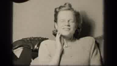 SEBRING OHIO USA-1942: Woman in Dress Smiles Then Clock Close-Up