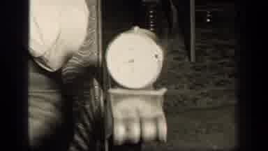 Sebring Ohio USA (1942): An Older Gentleman Munches On A Fruit At 8 While Sitting