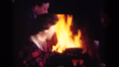 Skyline Drive Virginia USA (1943): People Sit Around A Fire A Person Moves Their