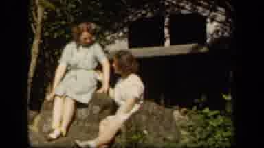 Skyline Drive Virginia USA (1943): Two Girls Sitting Outside Surrounded By Trees