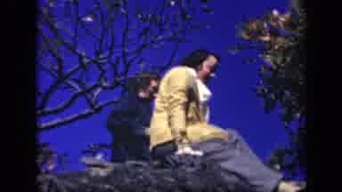 Skyline Drive Virginia USA (1943): Two Women Sit On A Rock While One Woman Removes