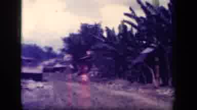 Leyte Gulf Philippines (1944): Camera Shows Off Village With Dirt Road As People