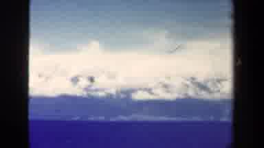 Papua New Guinea (1944): Scenery Of A Body Of Water And Mountains From Aerial View