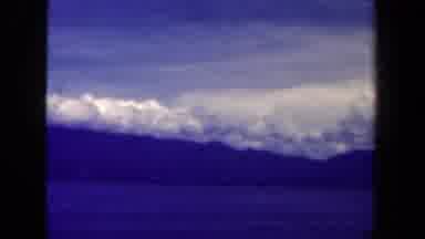 Papua New Guinea (1944): Beautiful View Of Clouds And Mountains Over A Lake