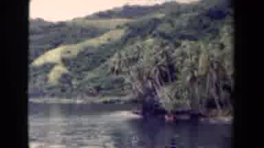 Papua New Guinea (1944): Expansive View Of A Waterway And A Mountain With Trees