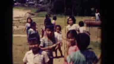 Kauai Hawaii USA (1944): Group Of Young Boys And Girls Playing Outside On A Sunny