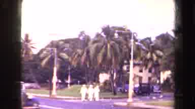 Kauai Hawaii USA (1944): Three Sailors Walking Down A Honolulu Street While Cars