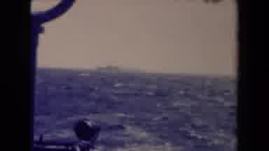 France (1945): Passing A Huge Ship In The Distance Out In The Middle Of The Ocean