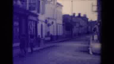 France (1945): Child Walking Across Empty Street Tall Buildings On Both Sides Of