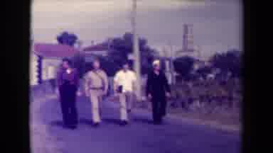 France (1945): Military Personnel From The Navy Walking Down A Path Outside