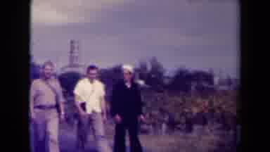 France (1945): Four Men Walking Together And Socializing