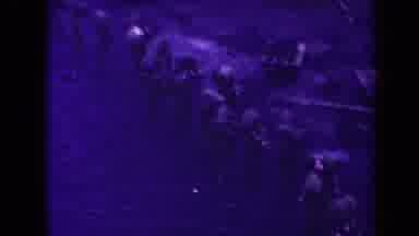 France-1945: A Large Group Of People Walk Together In A Line Towards A Common