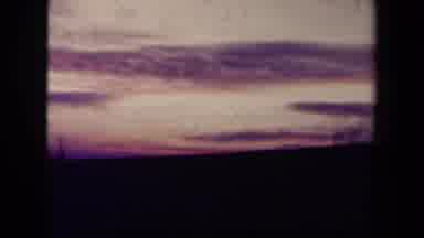 France (1945): Sunset And Beautiful Clouds By The Sea Seen From The Boat