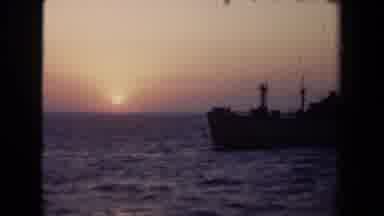 Netherlands (1946): Ship Sailing On Choppy Water With A Setting Or Rising Sun In