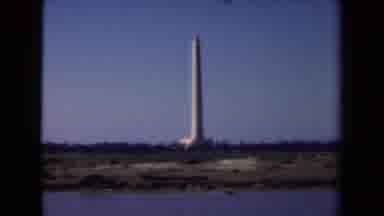 Netherlands-1946: Ship Sails By On The Water Past A Monument That Stand Tall In