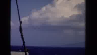 Netherlands-1946: Ocean View From Boat With Cloudy Sky And Rope