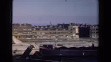 Netherlands (1946): Aerial View Of Grey City Buildings On Clear Sunny Day