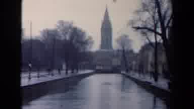 Netherlands (1946): Vintage Film Of A River Flowing Under A Large Building And A